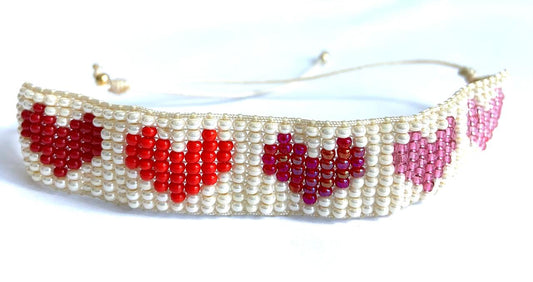 Corazonadas Fondo Beige Mix Rojos